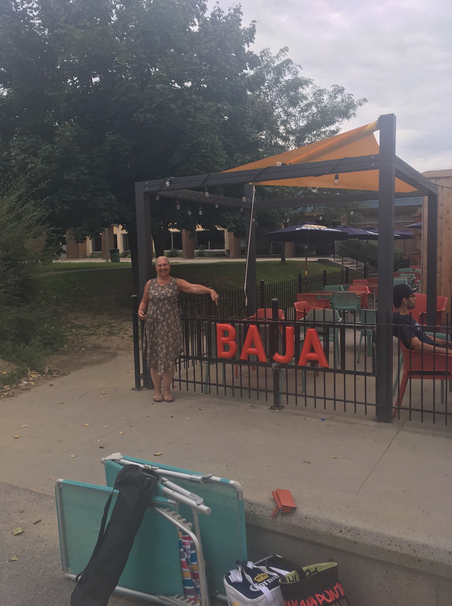 woman standing in front of Baja Restaurant, Brittania Beach